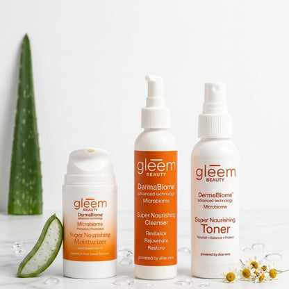 Gleem Beauty's Dermabiome product lineup (Cleanser, Toner, and Moisturizer) against a white background.